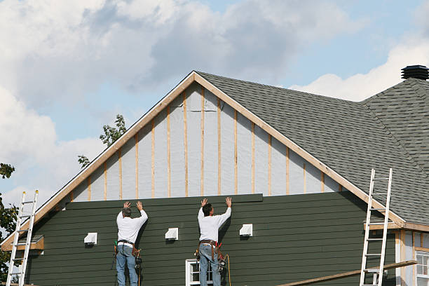 Professional Siding Replacement technician working in Wilmington, NC